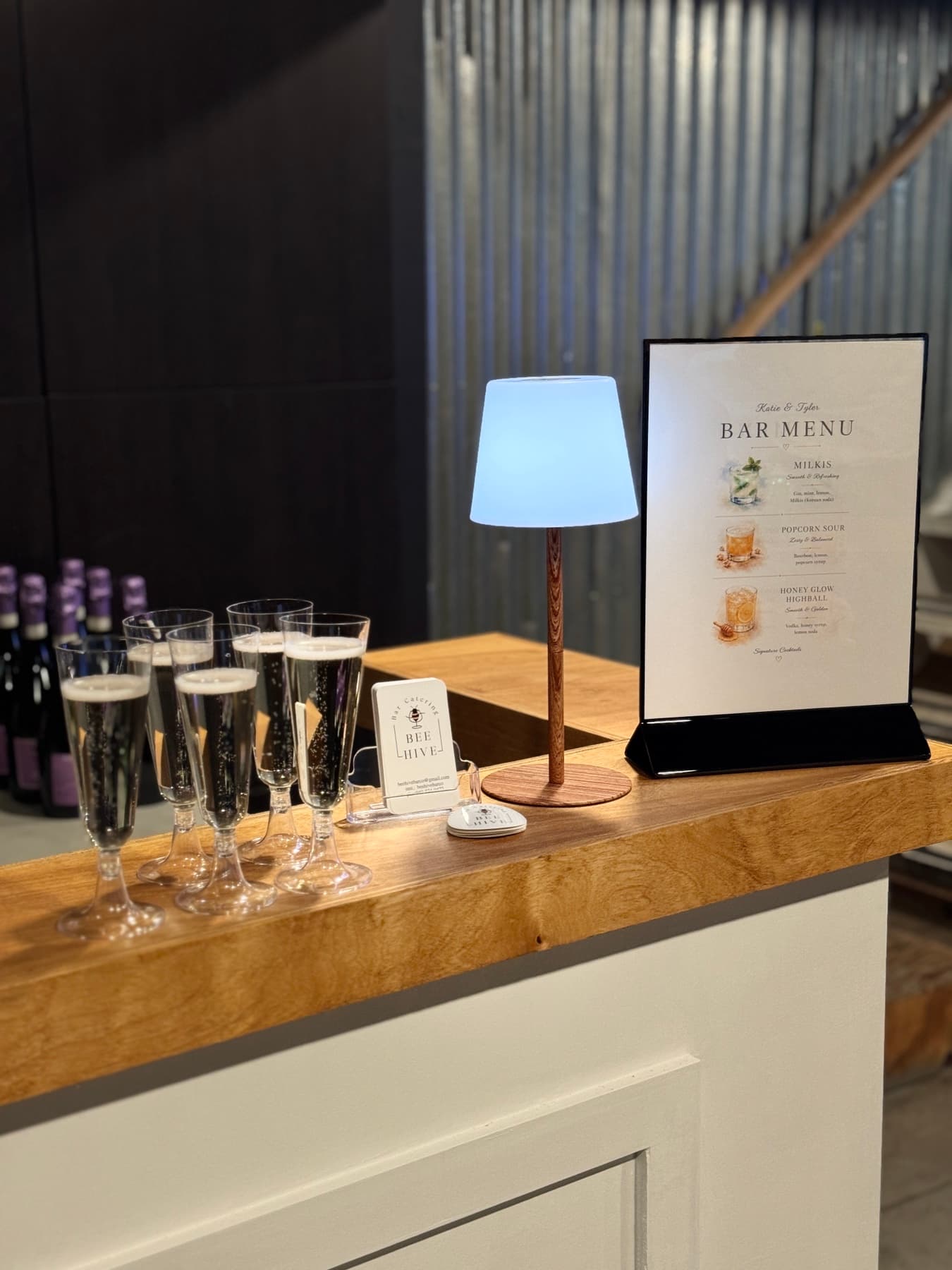 BeeHive mobile bar with a custom menu and welcome drinks at an event