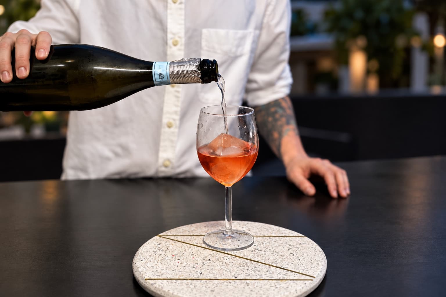 BeeHive bartender pouring a cocktail at an Orange County event